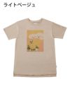レディースチュニックTシャツ お花を見つめる犬