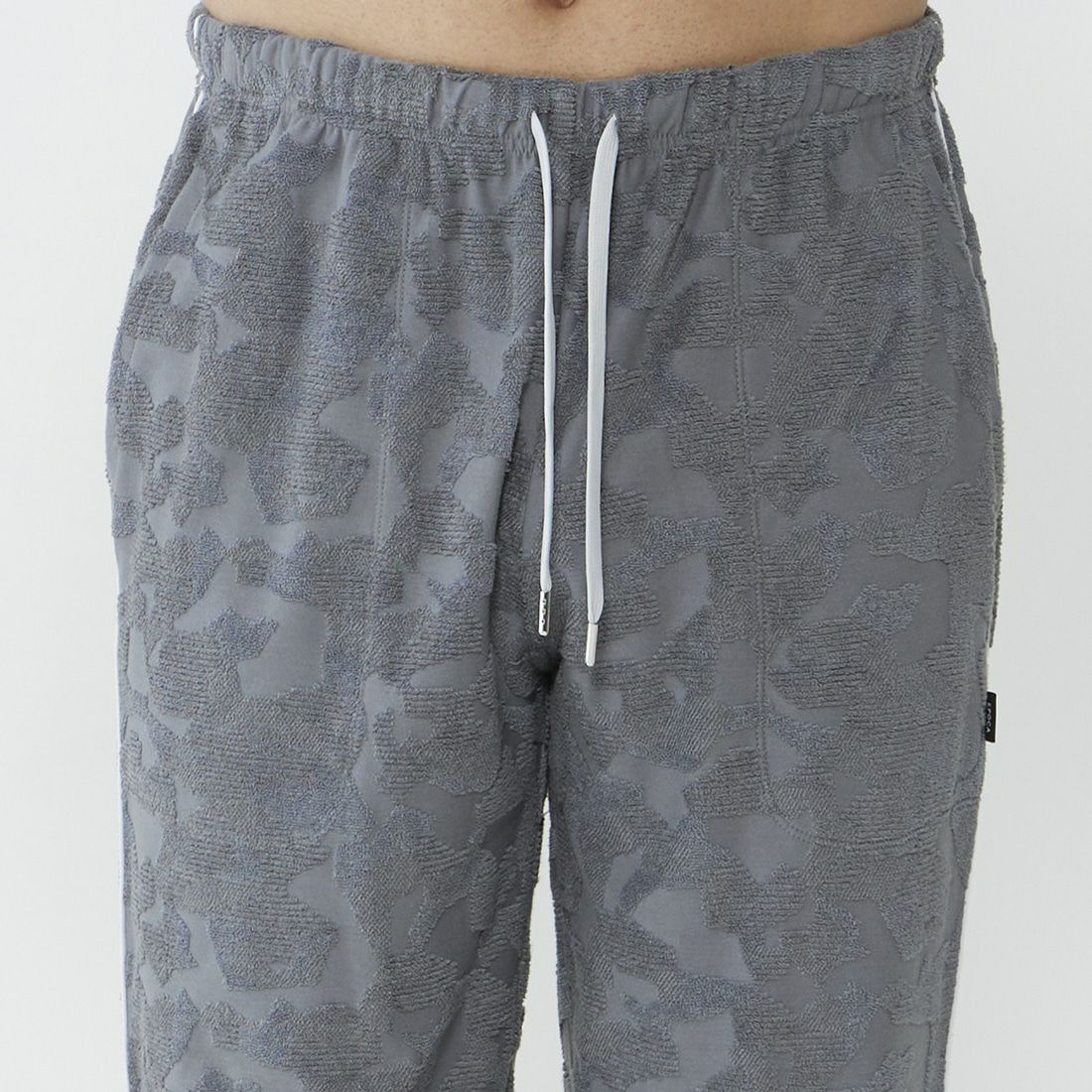 エポカ ウォモ ロングテーパードパンツ