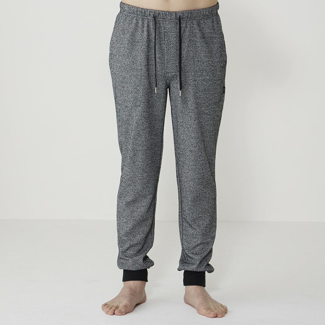 エポカ ウォモ 前開きロングリブテーパードパンツ