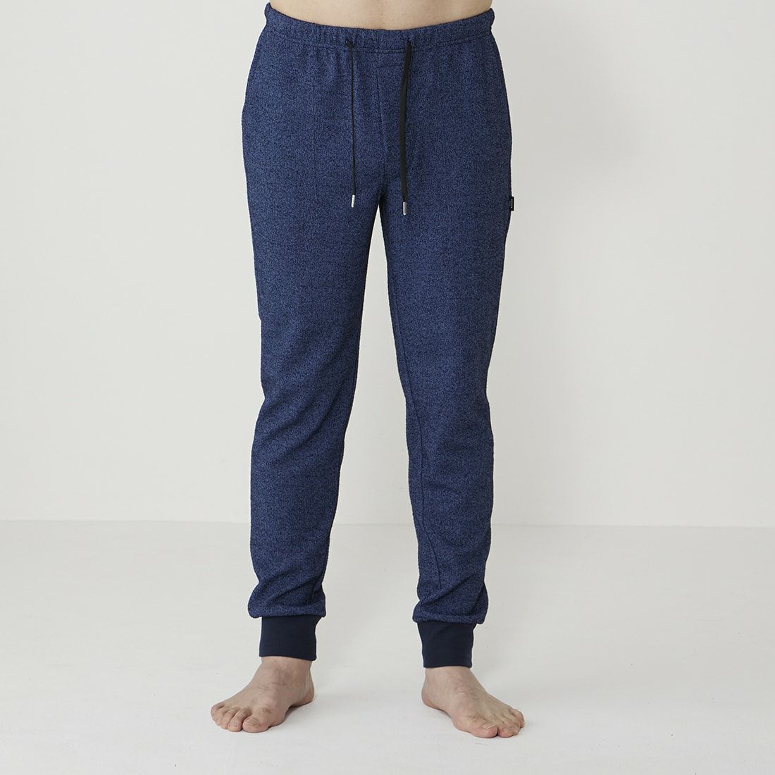 エポカ ウォモ 前開きロングリブテーパードパンツ