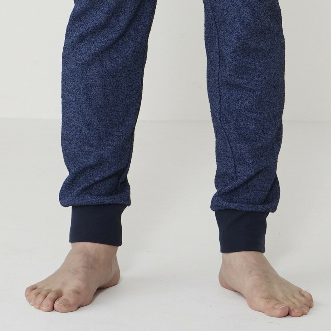 エポカ ウォモ 前開きロングリブテーパードパンツ