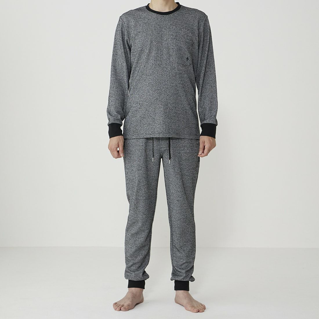 エポカ ウォモ 前開きロングリブテーパードパンツ