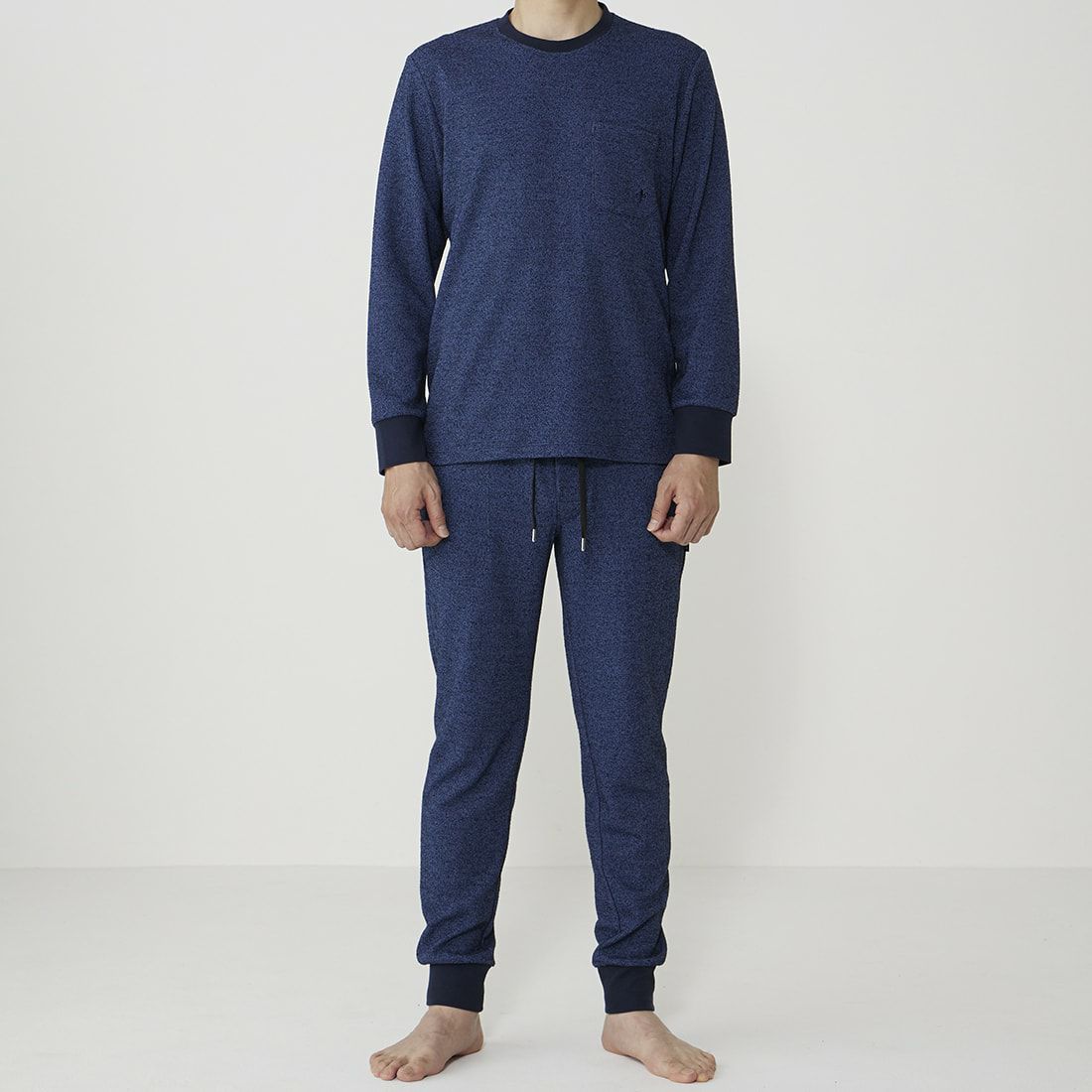 エポカ ウォモ 前開きロングリブテーパードパンツ