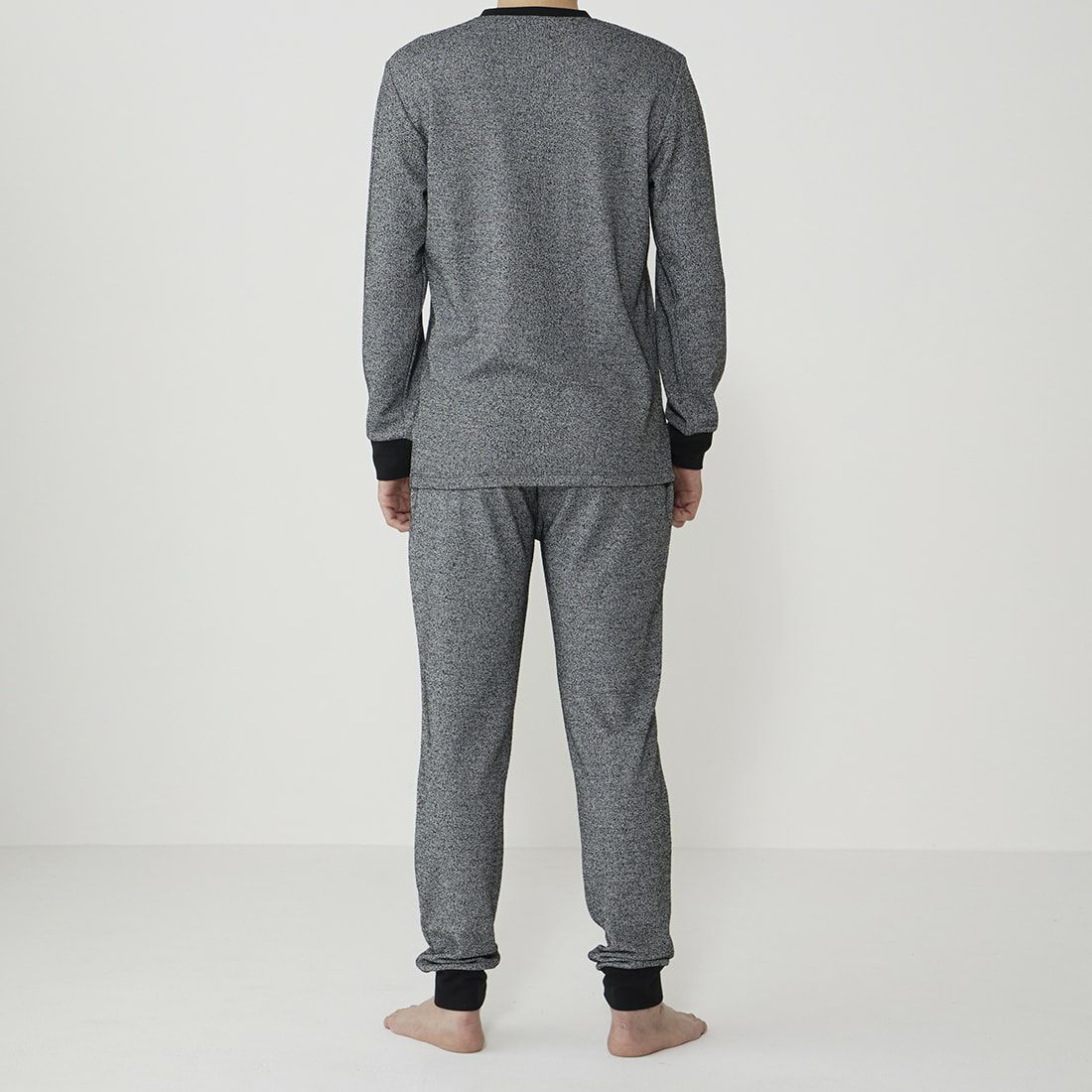 エポカ ウォモ 前開きロングリブテーパードパンツ