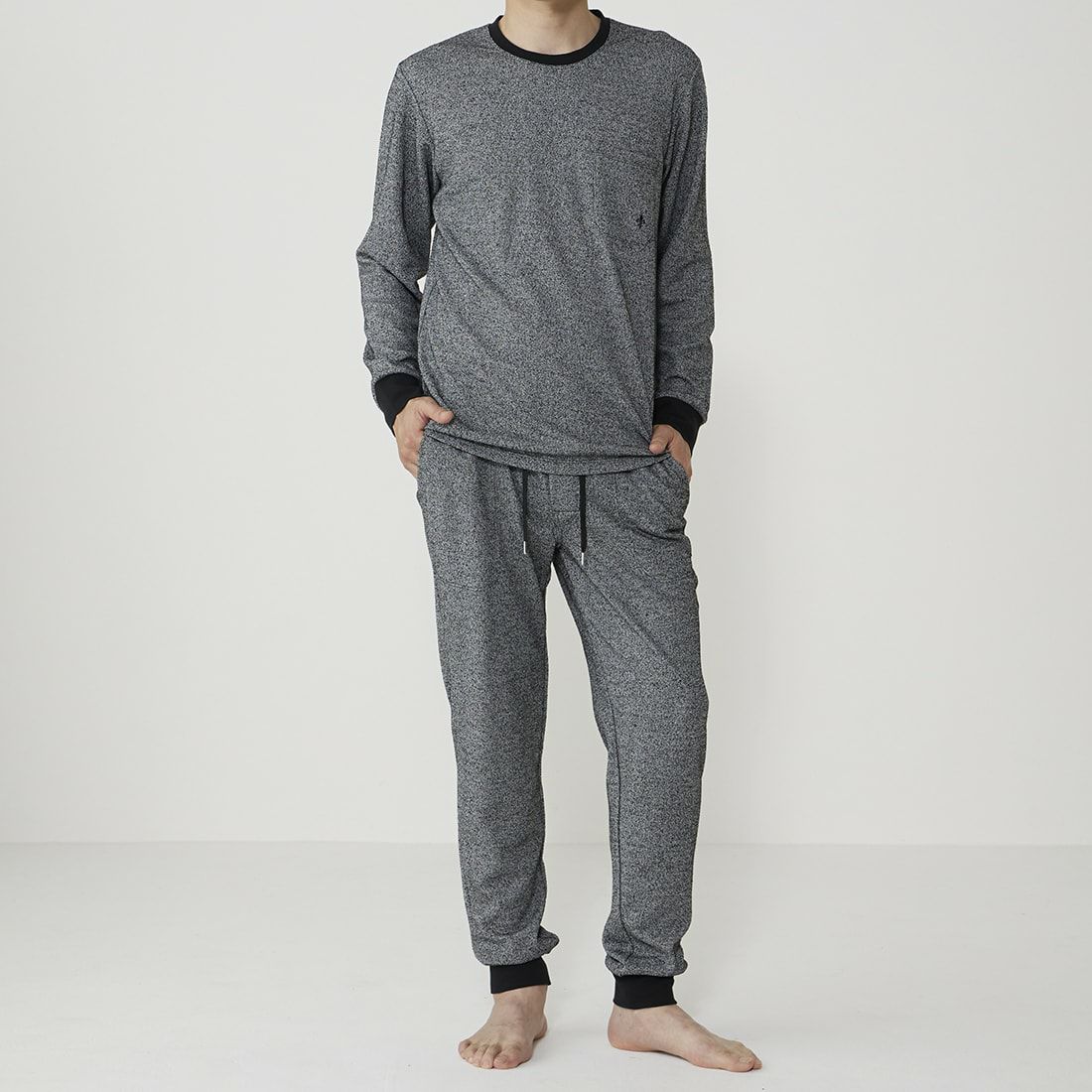 エポカ ウォモ 前開きロングリブテーパードパンツ