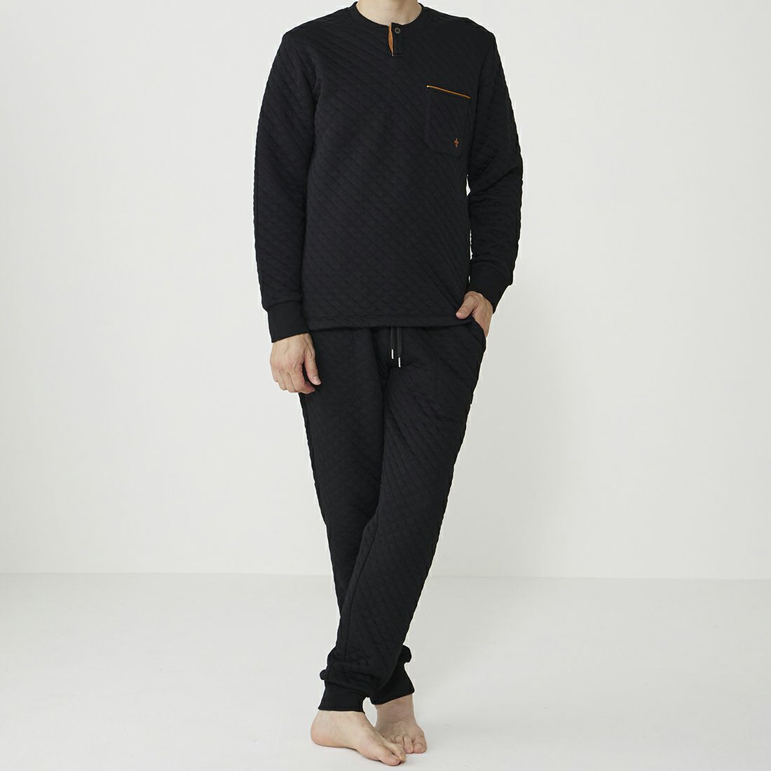 エポカ ウォモ 前閉ロングリブテーパードパンツ